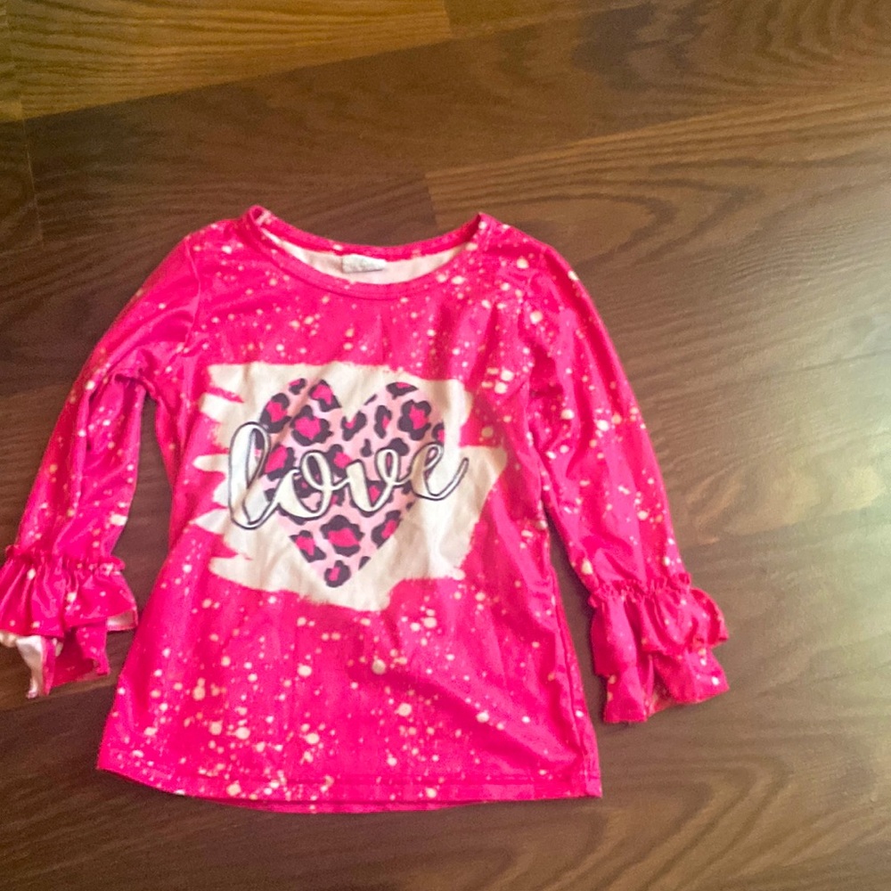 Cute hot pink love sleeve top for toddler girl .